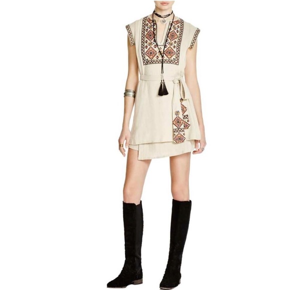 Free People Dresses & Skirts - NWOT FREE PEOPLE RUNNING WILD WRAP DRESS